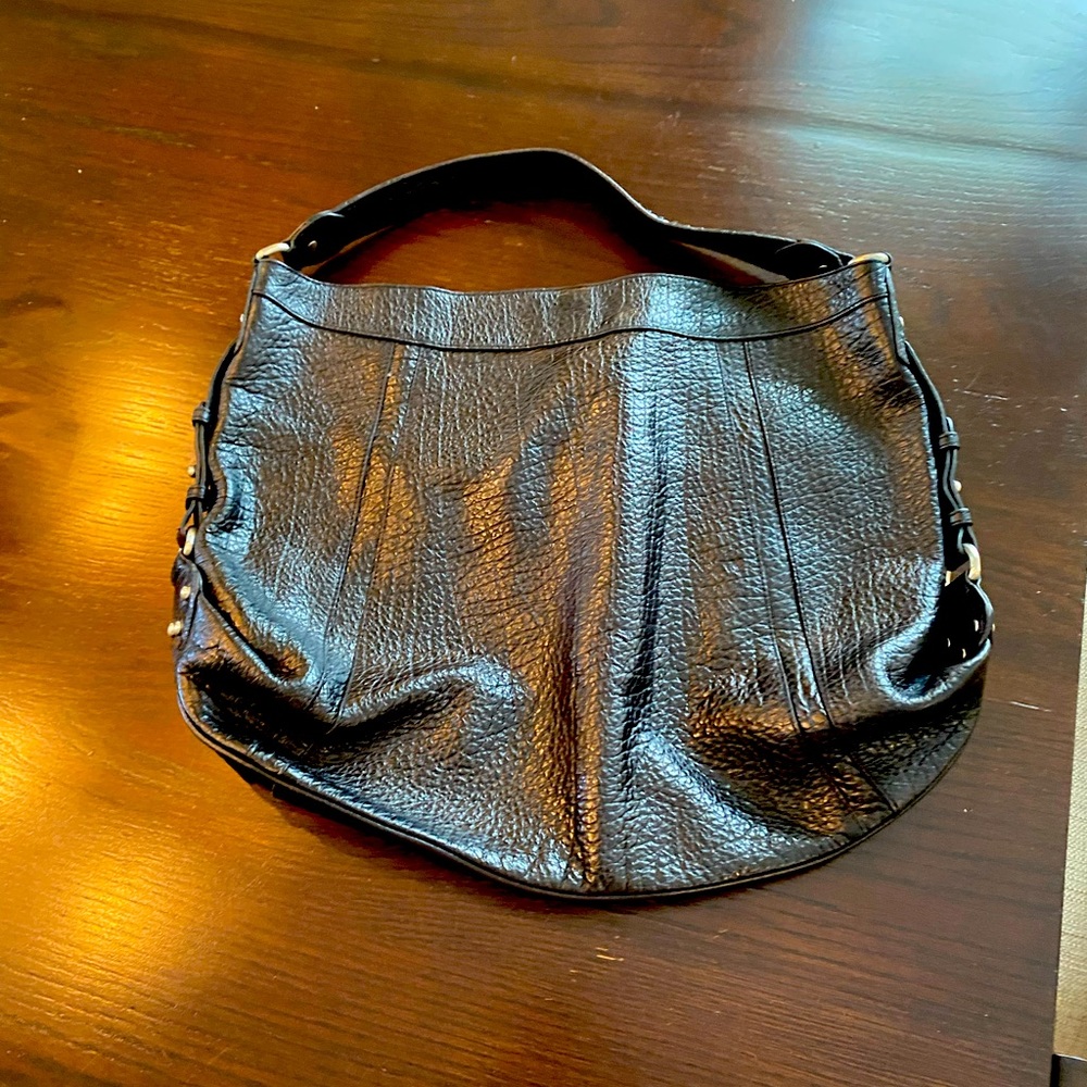 Black leather Kenneth Cole Bag with silver chain details on handle and sides